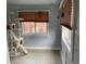 Cozy room with cat tree and window with blinds at 212 Walnut St, Greenfield, IN 46140