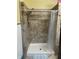Shower stall with tile surround and shower head at 212 Walnut St, Greenfield, IN 46140