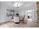 Dining room features a view into the kitchen at 24 Thornhurst Dr, Carmel, IN 46032