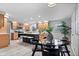 Bright kitchen features stainless steel appliances, wood cabinets and quartz countertops, plus a breakfast nook at 24 Thornhurst Dr, Carmel, IN 46032