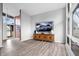Bright living room with hardwood floors, neutral tones, and stylish accents at 24 Thornhurst Dr, Carmel, IN 46032