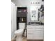 Neat bathroom showcasing updated vanity, toilet, and essential storage at 2421 Grand Fir Dr, Greenwood, IN 46143