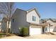 Charming two-story home with a one-car garage and well maintained lawn at 2421 Grand Fir Dr, Greenwood, IN 46143