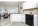 Efficient kitchen design with modern appliances, white cabinetry, and sleek countertops at 2421 Grand Fir Dr, Greenwood, IN 46143