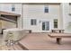 Spacious wooden deck featuring an outdoor grilling area, bench seating, and access to the home's interior at 250 W Tansey Crossing, Westfield, IN 46074