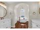 Luxurious bathroom features a soaking tub, chandelier, and -and- vanity at 250 W Tansey Crossing, Westfield, IN 46074