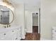 Bright bathroom boasts a vanity with double sinks and a walk-in shower, plus an additional door at 250 W Tansey Crossing, Westfield, IN 46074