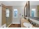 Bright bathroom with a double vanity and enclosed tile shower at 250 W Tansey Crossing, Westfield, IN 46074