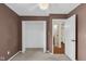 Bedroom with a closet and entry door and beige carpet at 250 W Tansey Crossing, Westfield, IN 46074