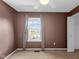 Brown bedroom with a window with blinds and a door to the closet at 250 W Tansey Crossing, Westfield, IN 46074