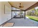 Covered outdoor patio featuring a ceiling fan and stamped concrete at 250 W Tansey Crossing, Westfield, IN 46074