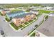 An aerial view showing colorful townhouse exteriors with tree-lined streets and sidewalks at 2578 Filson St, Carmel, IN 46032