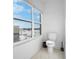 Bright bathroom with large window, toilet and tiled floor at 2578 Filson St, Carmel, IN 46032
