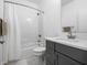 Bathroom featuring a shower and tub, a vanity with a sink, and modern fixtures at 2578 Filson St, Carmel, IN 46032