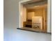A look into the kitchen from another room with a pass-through at 2843 Canterbury Ln, Indianapolis, IN 46220