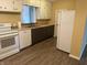 A kitchen with white appliances and cabinets with an oven at 2843 Canterbury Ln, Indianapolis, IN 46220