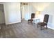 A bright, freshly carpeted living room featuring two cushioned chairs and neutral paint at 2843 Canterbury Ln, Indianapolis, IN 46220