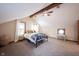 Spacious bedroom featuring vaulted ceiling, exposed beam and natural light at 2909 Huntsville Rd, Pendleton, IN 46064
