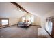 Bright bedroom with vaulted ceiling, ceiling fan, and a seating bench at 2909 Huntsville Rd, Pendleton, IN 46064