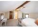 Spacious bedroom featuring vaulted ceilings, exposed beams, and en suite bathroom at 2909 Huntsville Rd, Pendleton, IN 46064