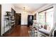 Kitchen area with shelving, stainless steel appliances, an eat-in nook, and natural lighting from the window at 2909 Huntsville Rd, Pendleton, IN 46064