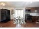 Kitchen area featuring stainless steel appliances, eat-in nook with a bay window and a decorative rug at 2909 Huntsville Rd, Pendleton, IN 46064