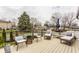 Inviting deck area with outdoor seating and a view of the surrounding neighborhood at 311 2Nd Ne St, Carmel, IN 46032