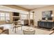 Open-concept living room featuring fireplace and stylish furnishings at 311 2Nd Ne St, Carmel, IN 46032