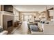 Spacious living room featuring a fireplace, dining area, and comfortable seating at 311 2Nd Ne St, Carmel, IN 46032