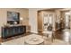 Living room featuring a blue cabinet and hardwood flooring at 311 2Nd Ne St, Carmel, IN 46032