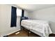 A cozy bedroom with a bed and window at 3142 N Euclid Ave, Indianapolis, IN 46218