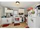 A full kitchen with appliances and ample cabinet space at 3142 N Euclid Ave, Indianapolis, IN 46218