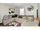A comfortable living room with a large sectional couch and natural light at 3142 N Euclid Ave, Indianapolis, IN 46218
