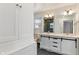 Stylish bathroom featuring double sinks with stunning countertops and ample storage at 3244 Devereaux Dr, Indianapolis, IN 46228