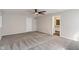 Spacious bedroom with hardwood floors, ceiling fan, and great natural light at 3244 Devereaux Dr, Indianapolis, IN 46228