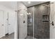 Luxurious glass shower with modern tiling and fixtures, creating a spa-like experience at 3244 Devereaux Dr, Indianapolis, IN 46228