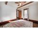 Bedroom with a ceiling fan, wood trim, and a window bringing in natural light at 331 W State St, Pendleton, IN 46064