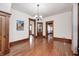 Formal dining room with hardwood floors, chandelier, and traditional millwork at 331 W State St, Pendleton, IN 46064