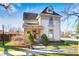 Charming two-story home featuring a dormer window, quaint front porch, and well-maintained lawn at 331 W State St, Pendleton, IN 46064