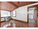 Bright dining area adjacent to the kitchen features an intimate table set and natural light at 331 W State St, Pendleton, IN 46064
