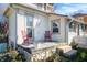 Inviting porch with rocking chairs and a stone foundation, perfect for relaxing outside the home at 331 W State St, Pendleton, IN 46064