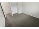 Comfortable bedroom offering plush gray carpeting and a spacious closet at 3662 Lombardy Pl, Indianapolis, IN 46226