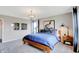 Comfortable main bedroom featuring neutral carpeting, accent lighting, modern decor, and ample natural light at 3721 Cantebury Dr, Franklin, IN 46131