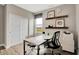 Well-lit office space with a desk, storage, and a window providing natural light and outdoor views at 3721 Cantebury Dr, Franklin, IN 46131