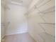 Walk-in closet with carpet, wire shelves and bars, and a light at 3892 Pelham Rd, Carmel, IN 46074