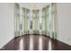 Dining room with lots of natural light from the large windows and elegant chandelier at 3892 Pelham Rd, Carmel, IN 46074