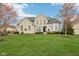 Charming front exterior of a two-story home with brick facade, manicured lawn, and curb appeal at 3892 Pelham Rd, Carmel, IN 46074