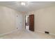 Modest bedroom showcasing carpet and dual closets at 3901 S Meridian St, Indianapolis, IN 46217