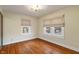 Bedroom featuring hardwood floors and natural light at 3901 S Meridian St, Indianapolis, IN 46217