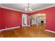Dining room with hardwood floors and natural light at 3901 S Meridian St, Indianapolis, IN 46217